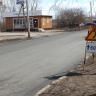 На улице Дагестанской завершаются работы по укладыванию выравнивающего слоя асфальта